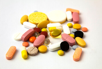 Tablets of different colors and sizes on a white background