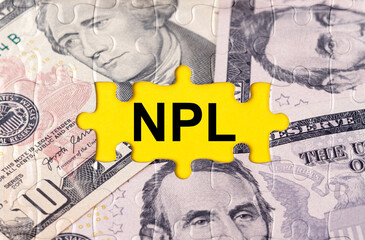 Puzzle with the image of dollars in the center of the inscription -NPL