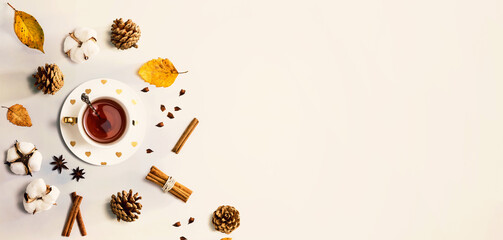 Autumn theme with cinnamon tea - flat lay