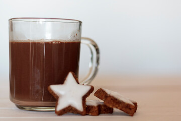 Hot chocolate and cookies on white background with copy space