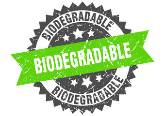 biodegradable stamp. grunge round sign with ribbon