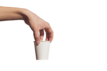 A person's hand is holding a disposable Cup