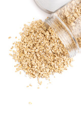 Oat flakes coming out of a opened jar
