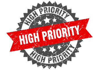 high priority stamp. grunge round sign with ribbon