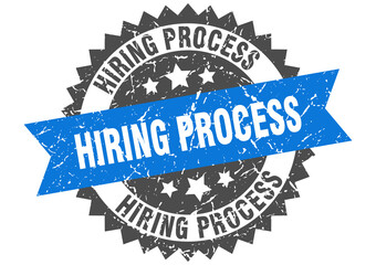 hiring process stamp. grunge round sign with ribbon