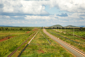 Fototapeta na wymiar The rail road line that parallels the Mombasa road near Emali, Kenya.