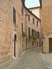 Italy, Marche, Mondavio downtown medieval street. 