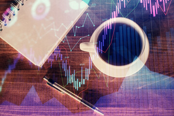 Multi exposure of forex chart drawing and work table top veiw. Concept of financial analysis.