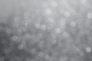 Grey or Gray abstract glitter background of shiny snowflakes for Christmas and Valentine. 