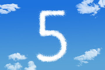 cloud shape of number five on blue sky