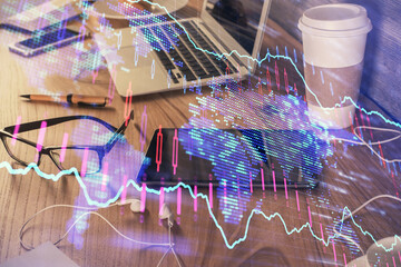 Double exposure of forex chart drawing and cell phone background. Concept of financial trading