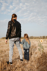Dad and daughter. Fatherhood, family concept. Loving father walking outdoors spending time together with his little daughter