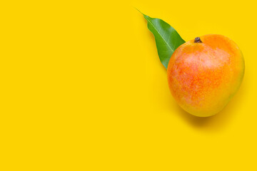 Tropical fruit, Mango on yellow background.