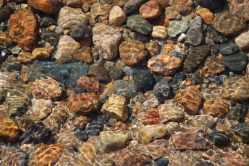Stones visible through the clear lake water in northern minnesota