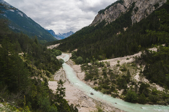View of the Isar River close to Scharnitz village, austrian Alps, during the summer