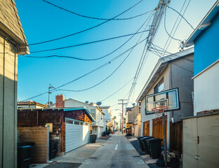 Fototapeta na wymiar Basketball hoop in a backstreet in Los Angeles