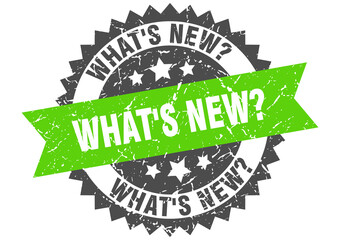 Obraz premium what's new? stamp. grunge round sign with ribbon