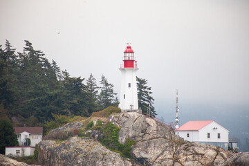 Fototapeta na wymiar A close up of the Historic Lighthouse at Lighthouse Point Park in West Vancouver off Point Atkinson, British Columbia, Canada