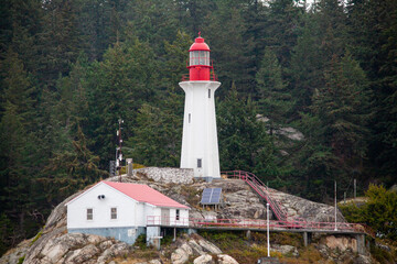 Fototapeta na wymiar A close up of the Historic Lighthouse at Lighthouse Point Park in West Vancouver off Point Atkinson, British Columbia, Canada