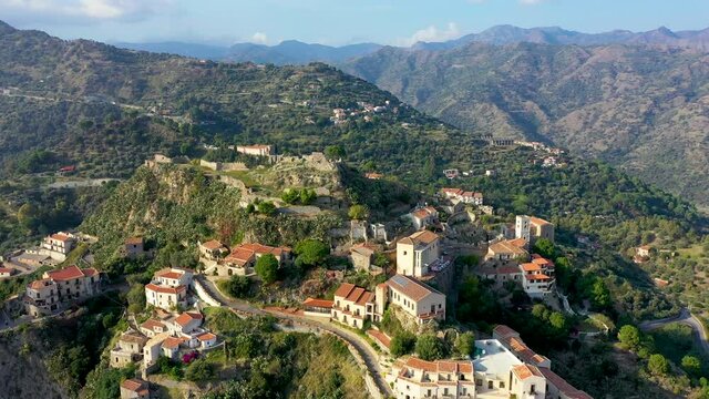 Aerial view of Savoca village in Sicily, Italy. Sicilian village Savoca (known from the Godfather movies). Houses on a hill in Savoca, small town on Sicily in Italy.
