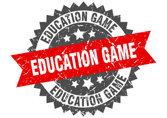 education game stamp. grunge round sign with ribbon