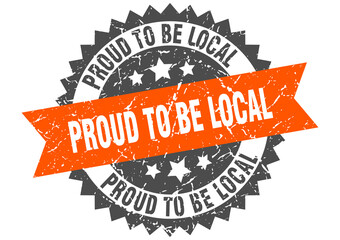 proud to be local stamp. grunge round sign with ribbon