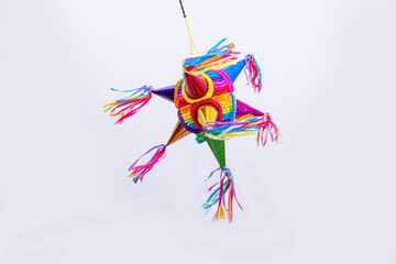Obraz premium piñata navideña, piñata de cumpleaños, colorida, fondo azul con luces brillantes, celebracion, fiesta, niños, dulces, alegria, celebrando 