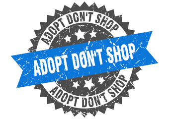 adopt don't shop stamp. grunge round sign with ribbon