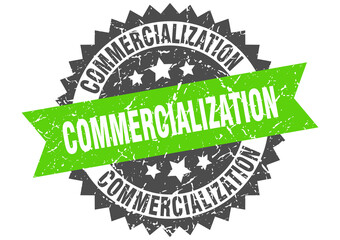 commercialization stamp. grunge round sign with ribbon