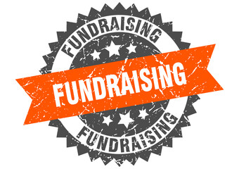 fundraising stamp. grunge round sign with ribbon