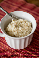 Spoon in a bowl of warm risotto