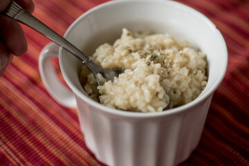 Risotto bowl on red placemat