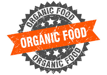 Fototapeta premium organic food stamp. grunge round sign with ribbon
