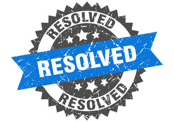 resolved stamp. grunge round sign with ribbon