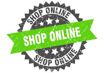 shop online stamp. grunge round sign with ribbon