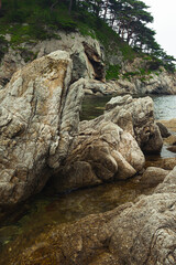 Rocks and sea, rocky coastline of the Bay.