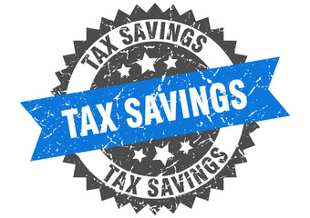 tax savings stamp. grunge round sign with ribbon