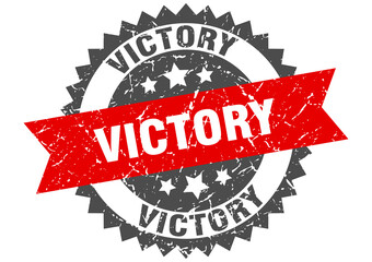 victory stamp. grunge round sign with ribbon