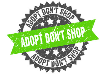 adopt don't shop stamp. grunge round sign with ribbon