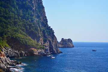 The coast of the Mediterranean sea with cliffs, Islands and yachts. Turkey, Alanya