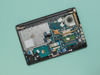 Open case of a modern laptop for repair production.