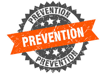 prevention stamp. grunge round sign with ribbon
