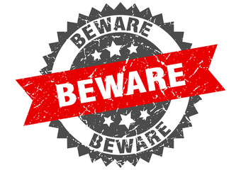 beware stamp. grunge round sign with ribbon