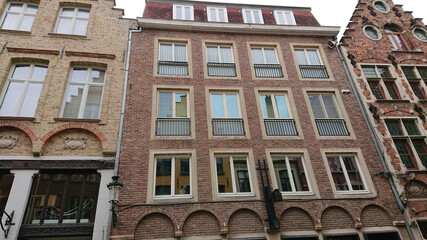 Roofs And Windows Of Old Authentic Brick Houses In Bruges, Belgium