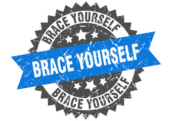 brace yourself stamp. grunge round sign with ribbon