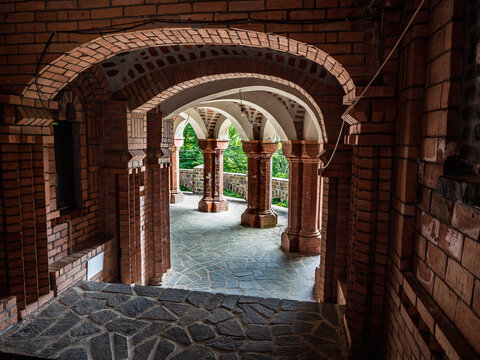 Beautiful archway with white and brown brick into geometrical design 