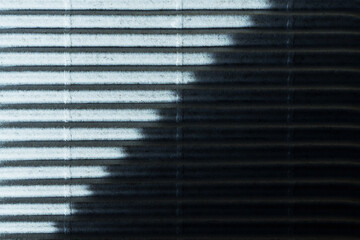 Corrugated white paper with blue shade. Horizontal contrast stripes with diagonal shadow, hard...