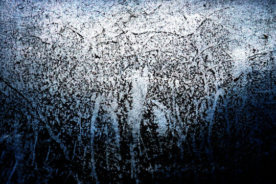 Grunge background. White concrete wall with black particles of dirt and smudges, blue color. Abstract texture surface. Copy space, dark moody, horrible oppressive atmosphere © akininam