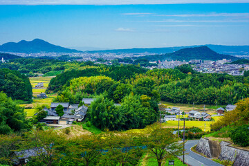 Fototapeta na wymiar 明日香村から見る二上山と畝傍山
