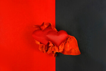    Valentines day concept. Romantic backgound, red hearts on red black background, copy space            